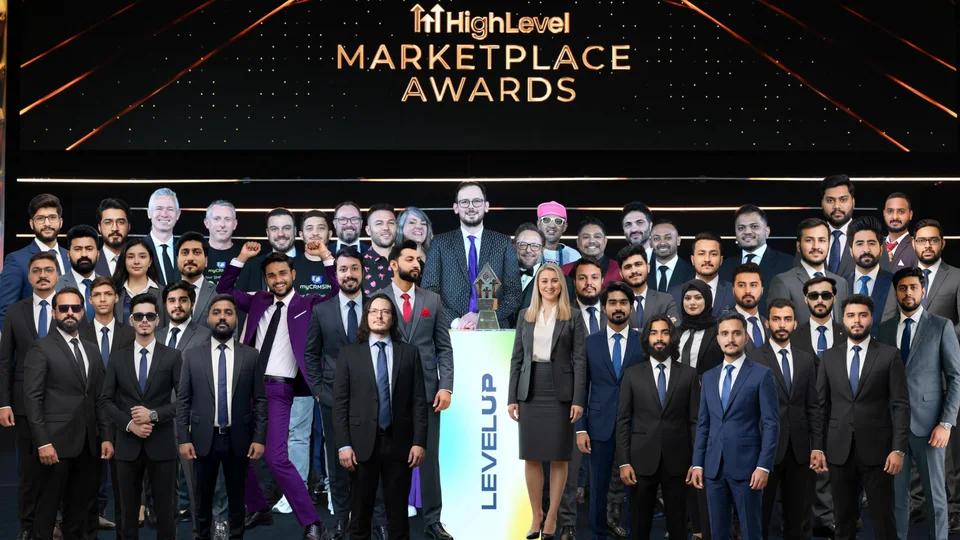 The team on stage at the HighLevel Marketplace Awards